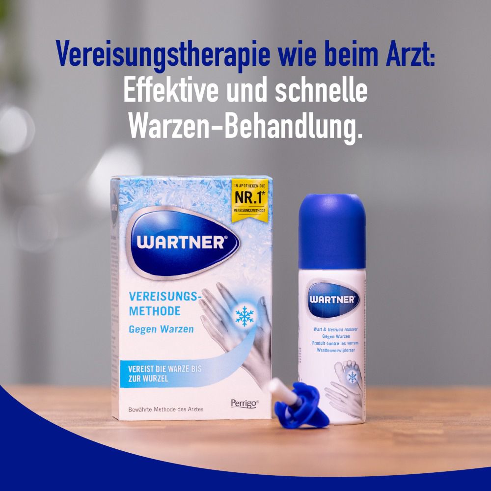Produkt und Verpackung von WARTNER® gegen Warzen. Spraydose und Schachtel stehen auf einem Tisch.