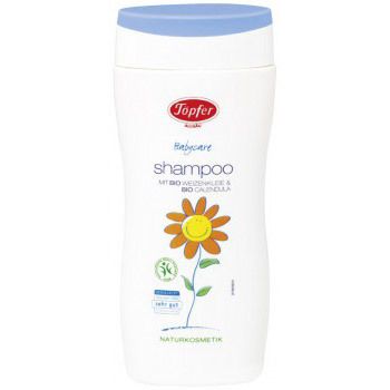 Weiße Flasche mit blauem Deckel. Aufschrift: Töpfer Babycare Shampoo. Mit Bio-Weizenkleie & Bio-Calendula. Aufdruck: Blume.