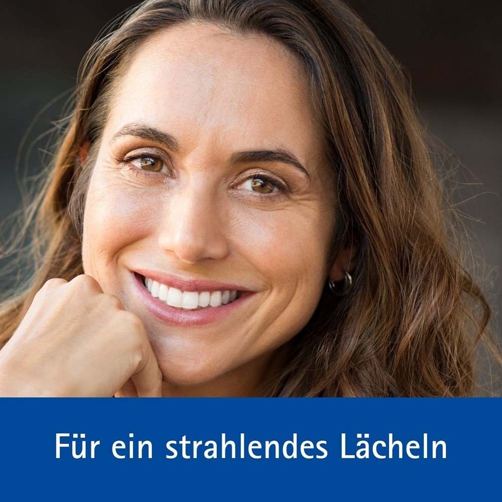 Lächelnde Frau. Text: Für ein strahlendes Lächeln.