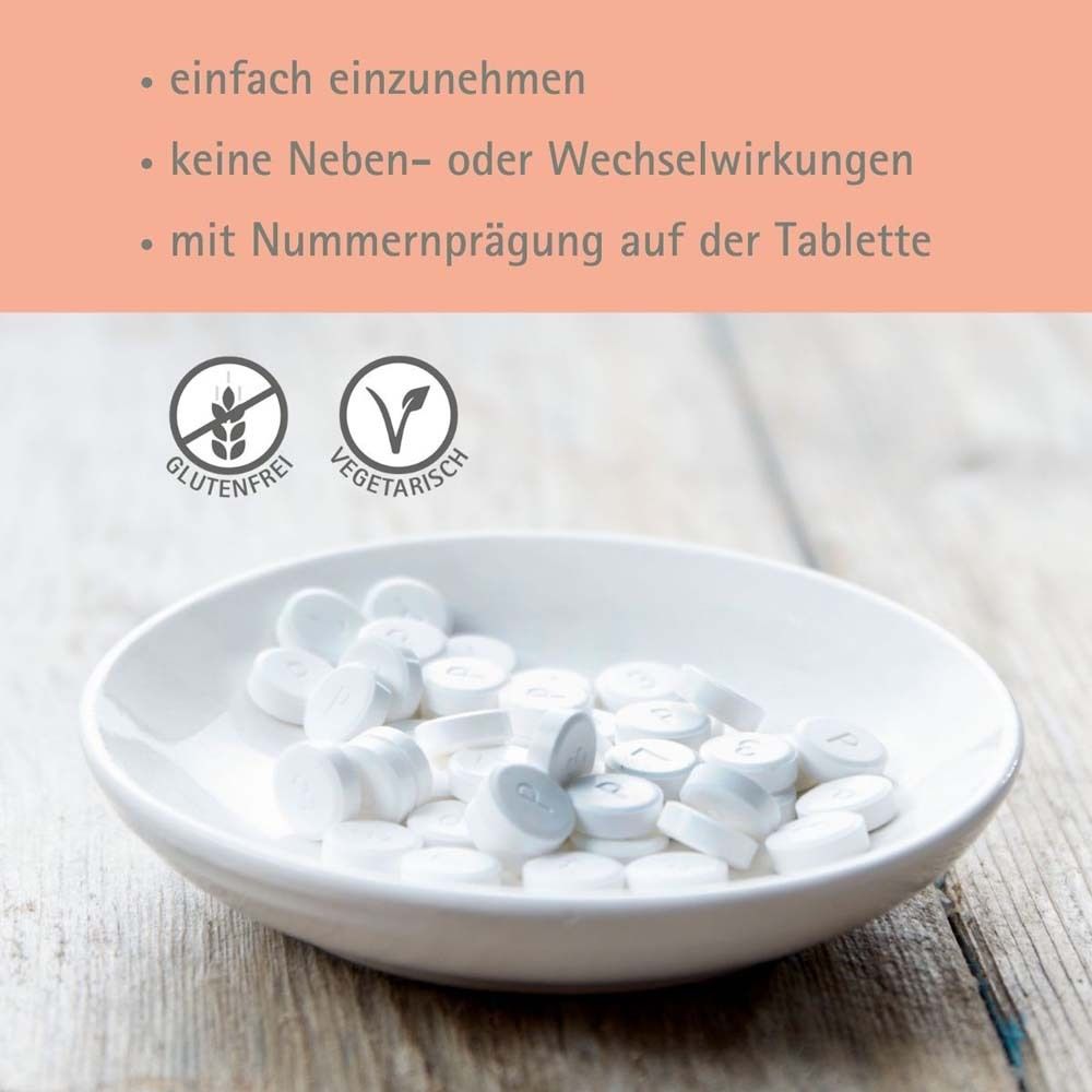 Tabletten in Schale. Glutenfrei und vegetarisch. Aufschrift: Mit Nummerprägung auf der Tablette.