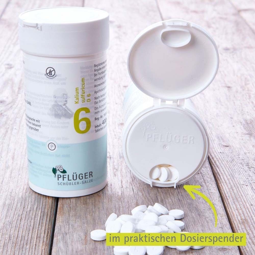 Dose mit Tabletten im praktischen Dosierspender. Aufdruck: Pflüger, Schüßler-Salze, Nr. 6.