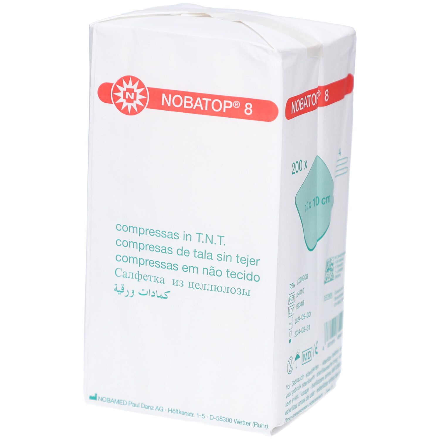 Verpackung mit Kompressen. Aufschrift: NOBATOP 8, 200 Stück, 10 x 10 cm. Weißes Paket mit roter und grüner Beschriftung.