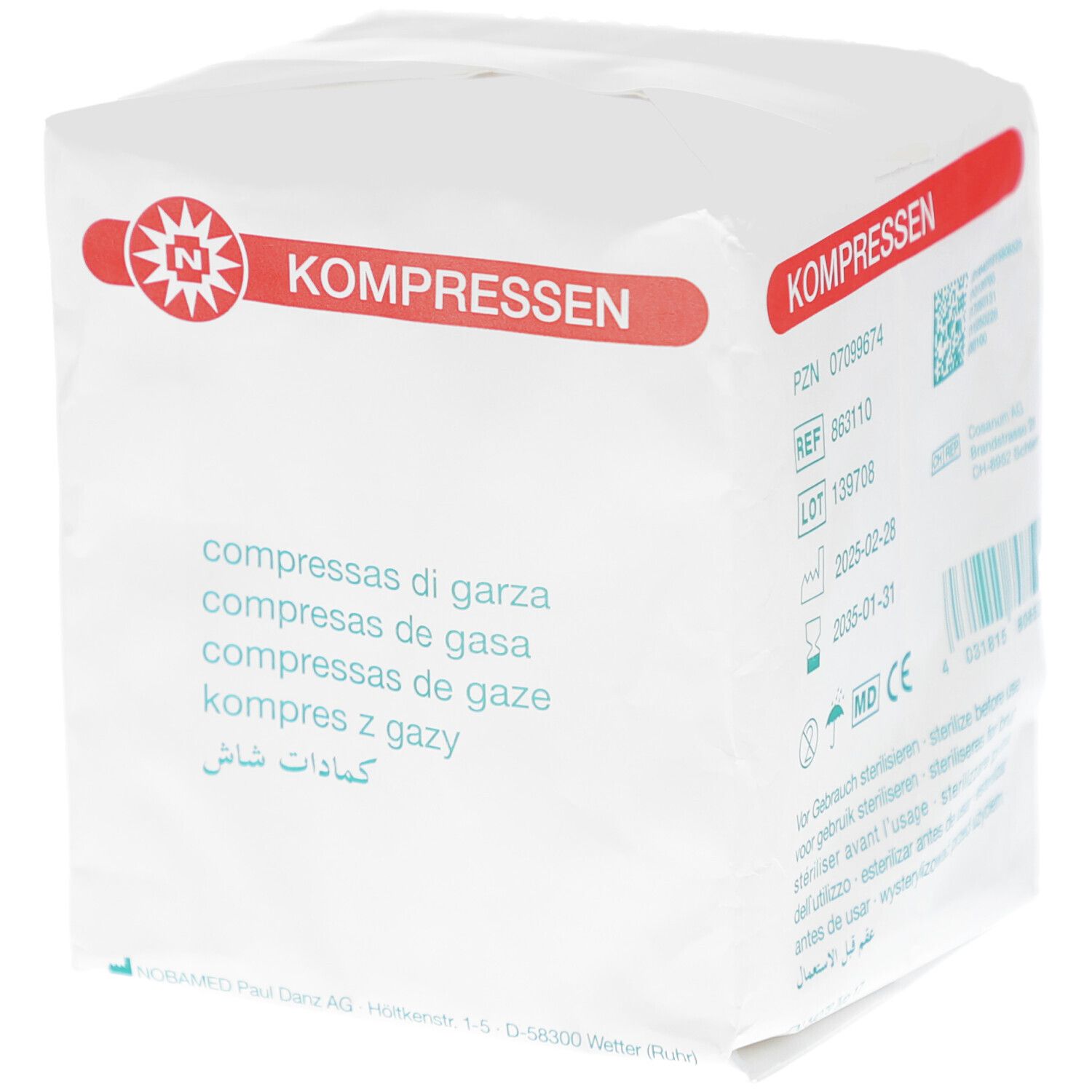 Verpackung mit Kompressen. Aufdruck: Kompressas di garza, Kompressas de gasa, Kompressas de gaze. Roter Streifen mit Schriftzug KOMPRESSEN.