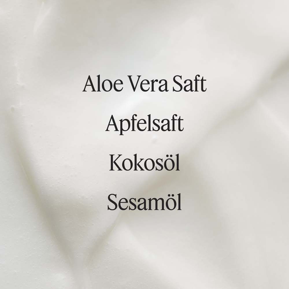 Text: Aloe Vera Saft, Apfelsaft, Kokosöl, Sesamöl. Auf weißem Hintergrund.