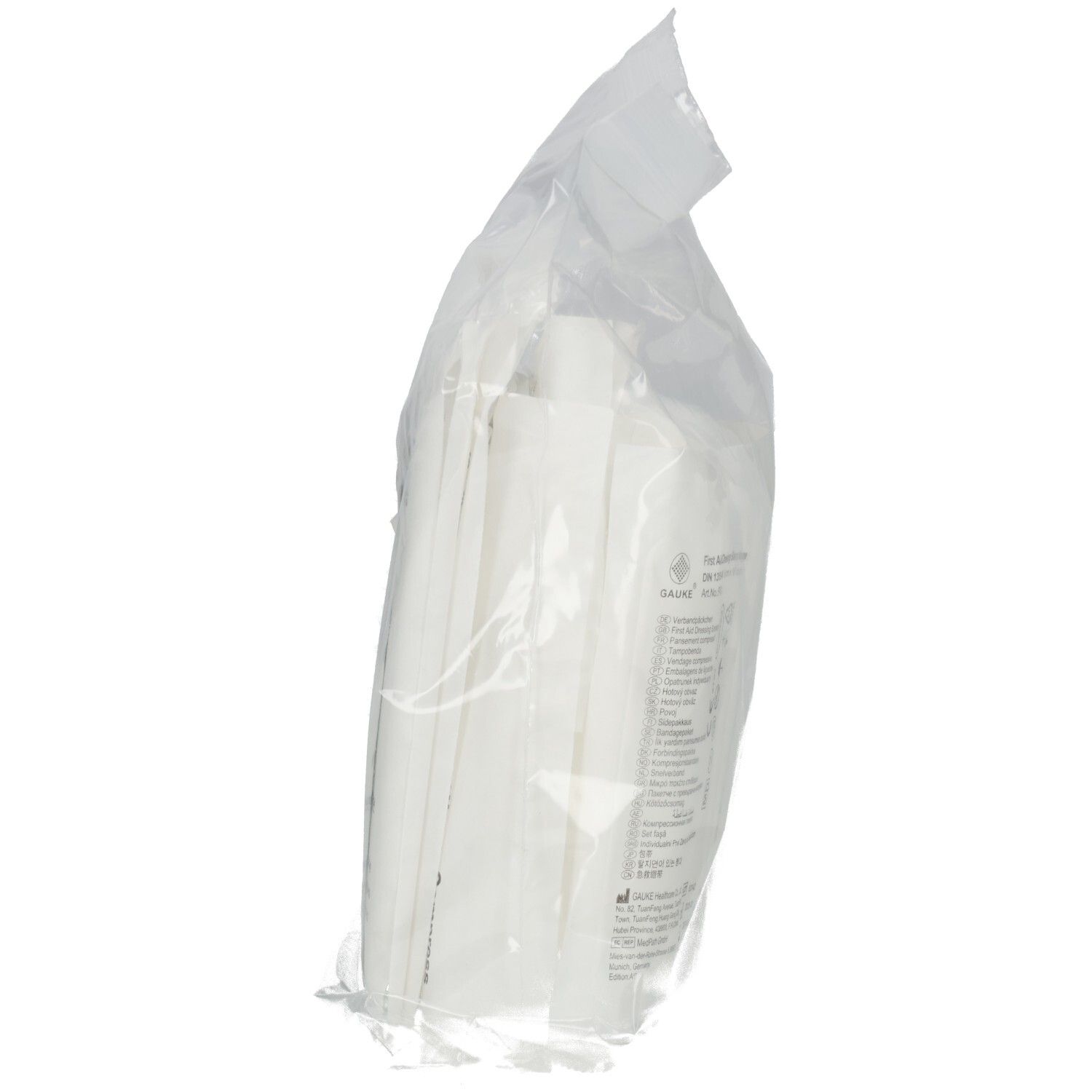 Verbandkasten Nachfüllset, Seitenansicht. Sterile Kompressen in transparenter Folie verpackt. Produktinformationen auf der Verpackung.