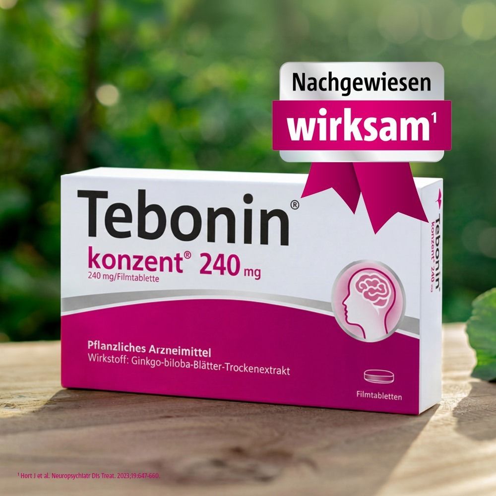 Frau hält Tablette. Text: Die kleinste Tablette mit 240 mg Ginkgo-Extrakt im Markt.