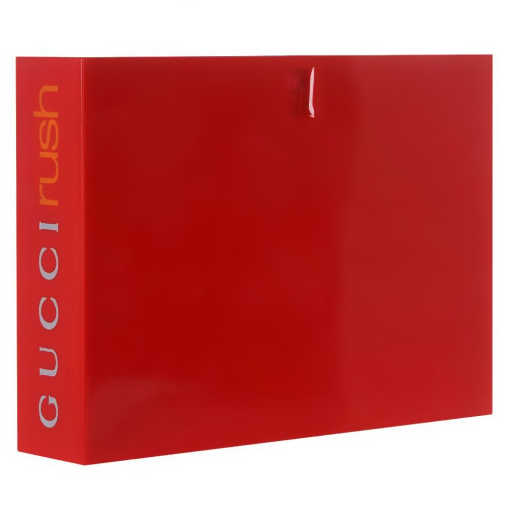 Rote rechteckige Verpackung. Auf der Seite steht vertikal in Silber "GUCCI rush".
