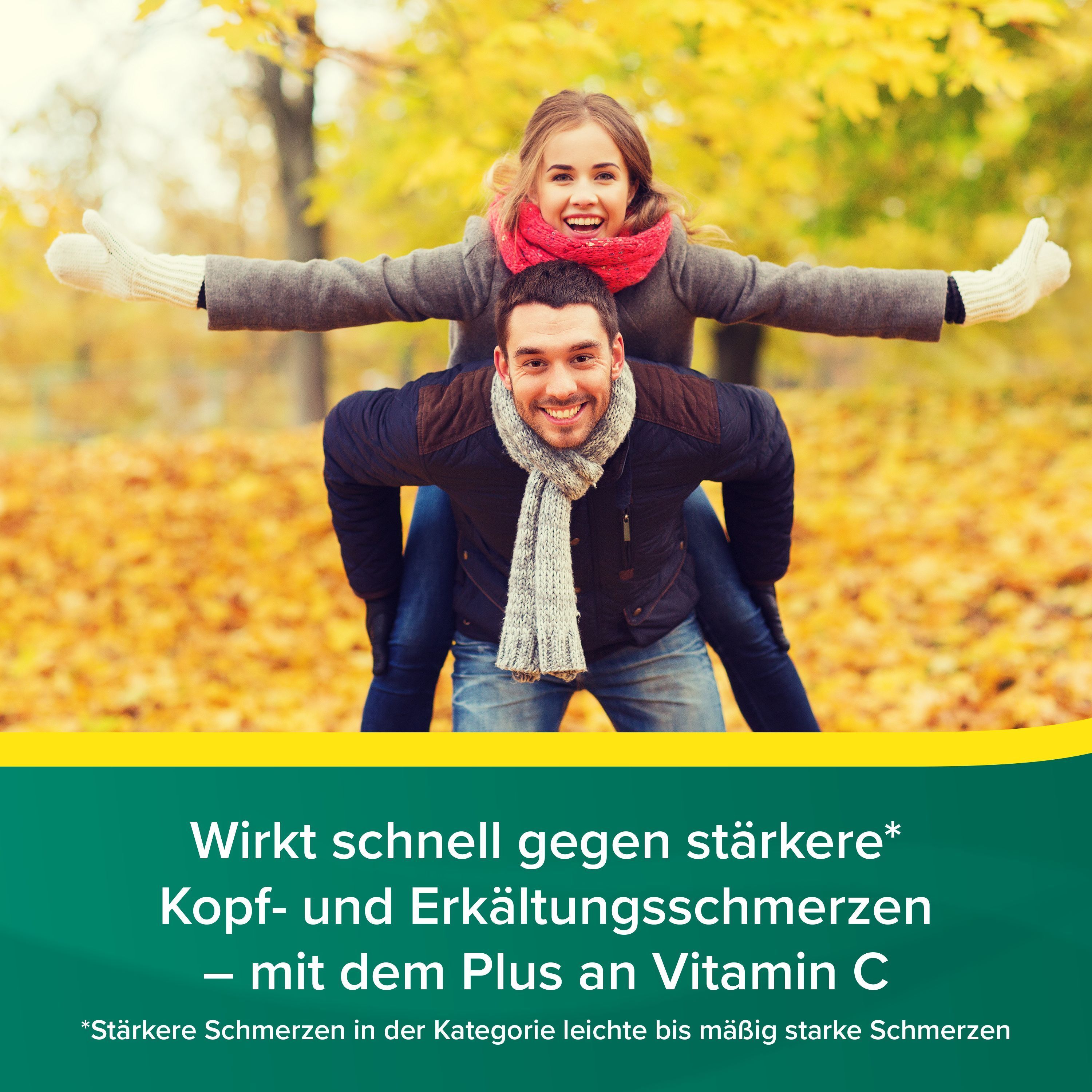 Ein Mann trägt eine Frau auf dem Rücken. Text: Wirkt schnell gegen Kopf- und Erkältungsschmerzen – mit dem Plus an Vitamin C.
