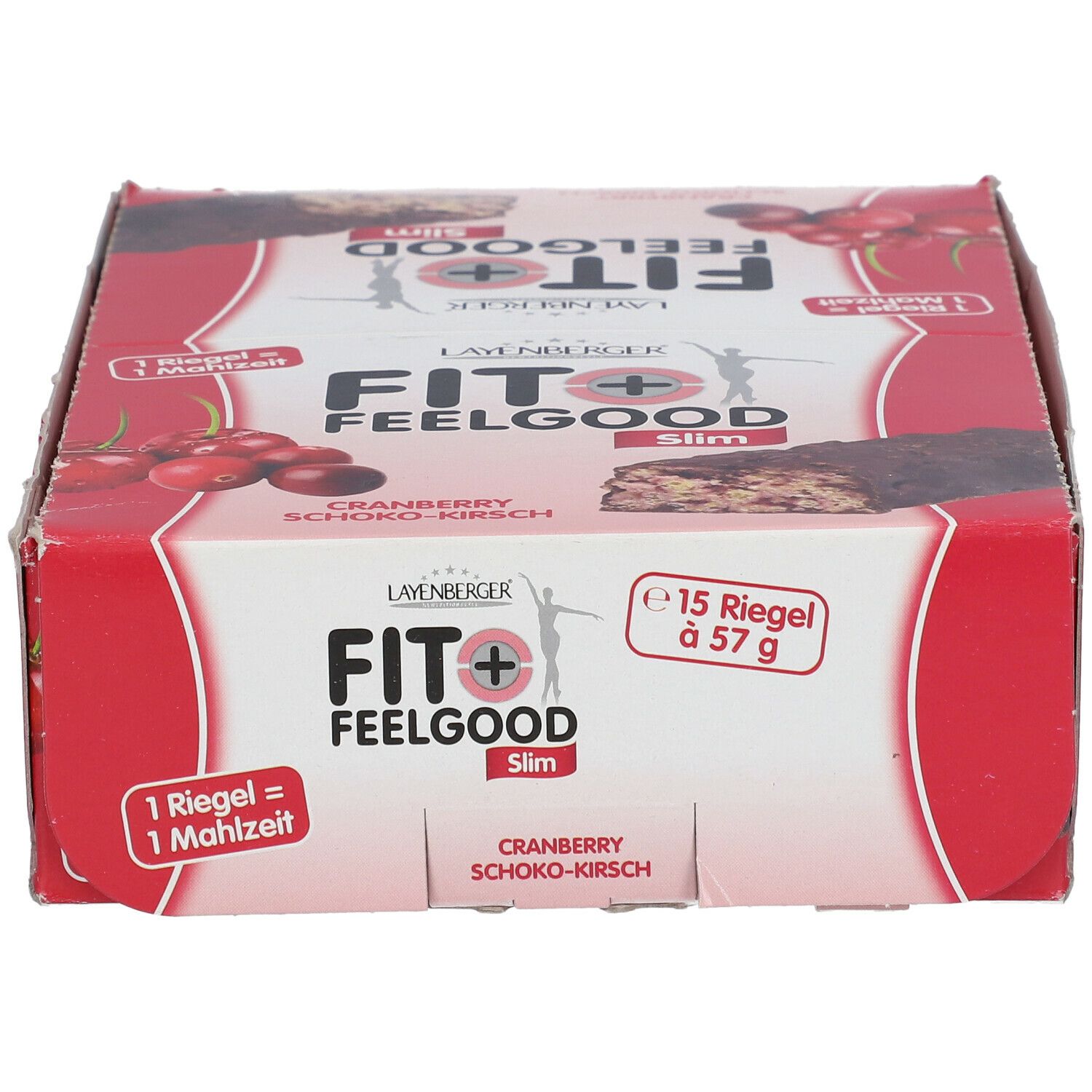 Rote Kartonverpackung mit LAYENBERGER Fit+ Feelgood Slim Riegeln. Aufdruck: Cranberry Schoko-Kirsch, 15 Riegel à 57 g.