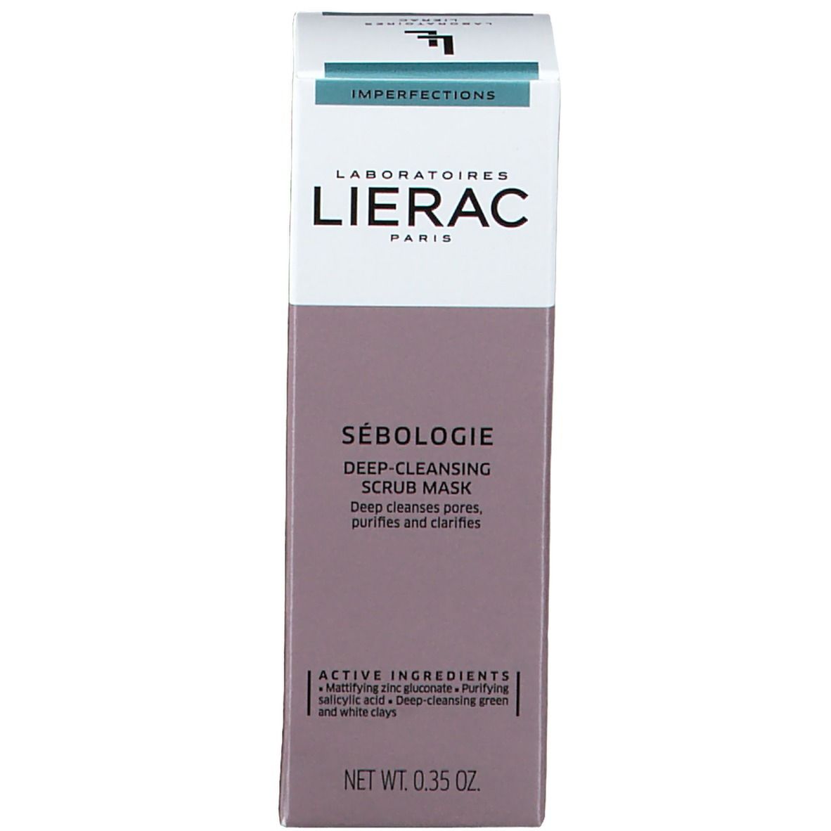 Kartonverpackung mit Produktinformationen. Text: SÉBOLOGIE DEEP-CLEANSING SCRUB MASK. Enthält Zinkgluconat und Salicylsäure. Nettogewicht: 0,35 OZ.