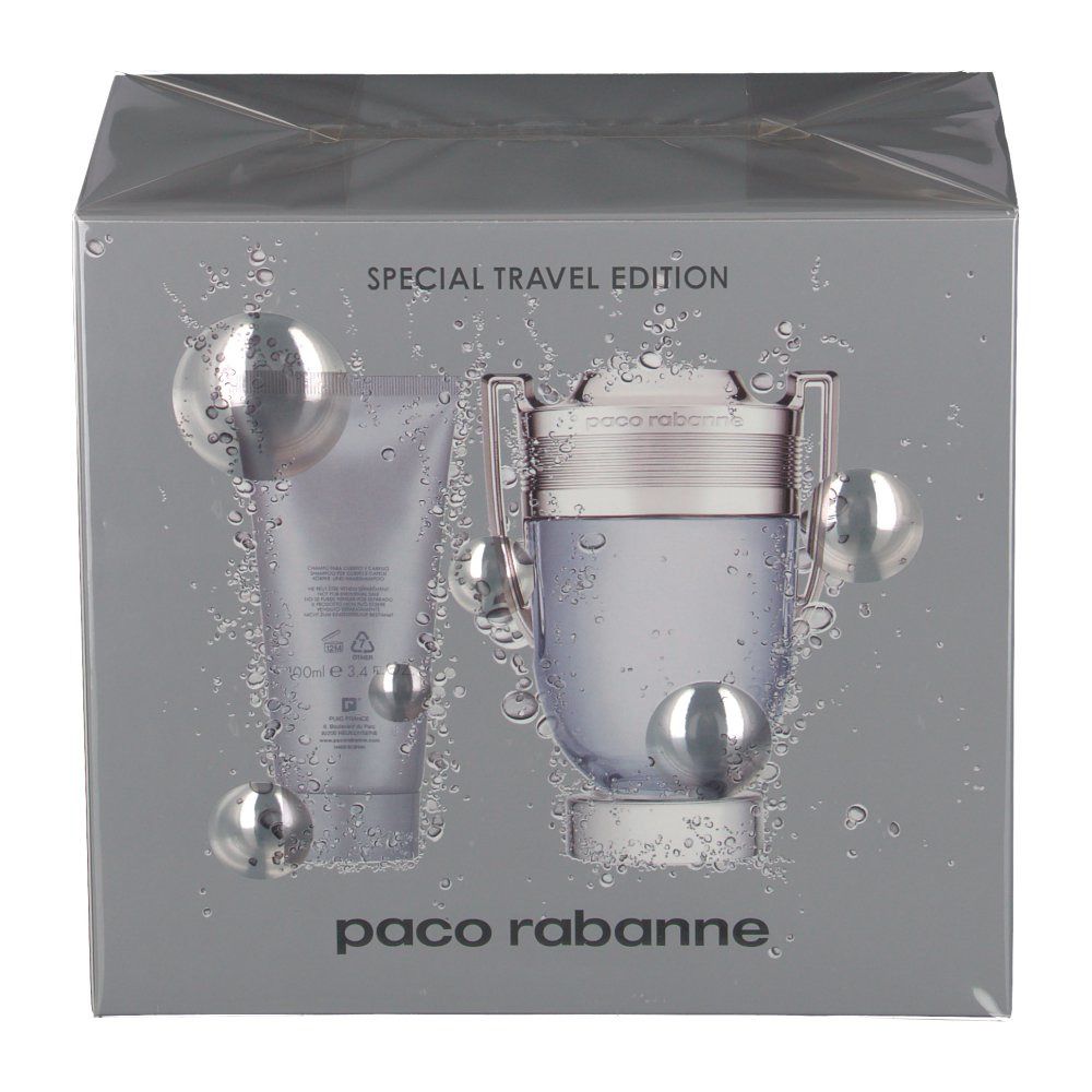 Geschenkset mit Flakon und Tube. Aufschrift: INVICTUS, paco rabanne. Verpackung mit silbernen Kugeln.