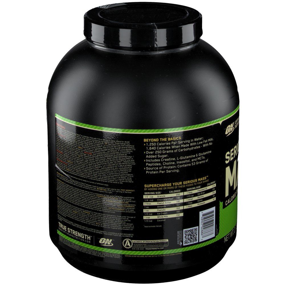 Rückseite des schwarzen Behälters. Text mit Nährwertangaben und Zutaten. "Serious Mass" und "Optimum Nutrition" Logo.