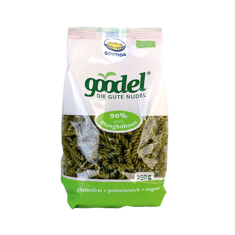 Verpackung mit grünen Nudeln. Aufschrift: Govinda, Goodel, 90% grüne Mungbohnen, glutenfrei, proteinreich, vegan.