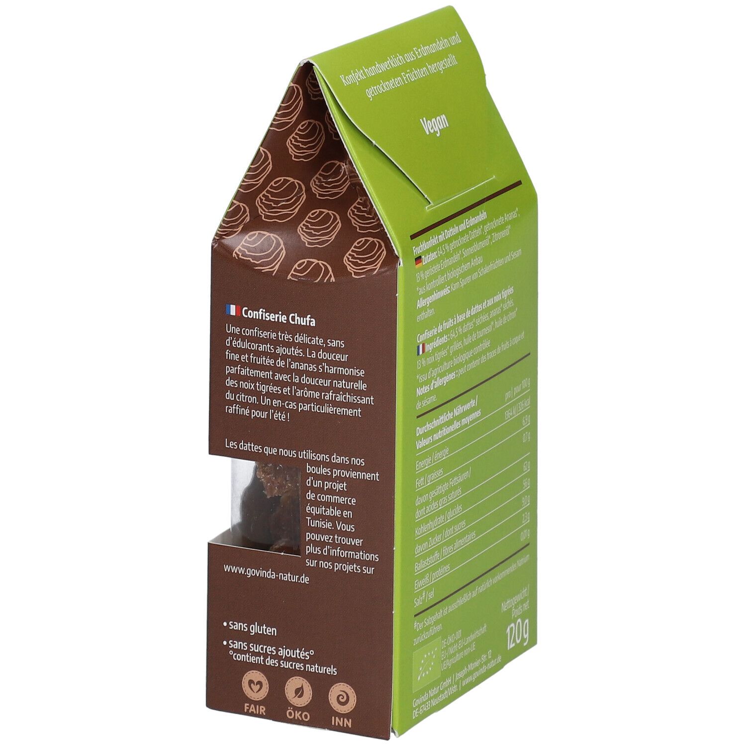 Verpackung mit Text, Nährwertangaben und "Vegan" Schriftzug. "Bio" Siegel. Sichtfenster mit Konfekt.