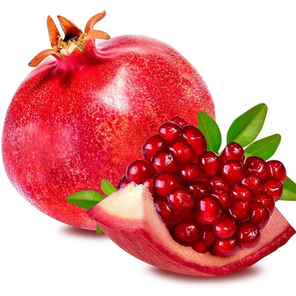 Granatapfel, rot, mit Kernen und Blättern. Ein Teil aufgeschnitten.