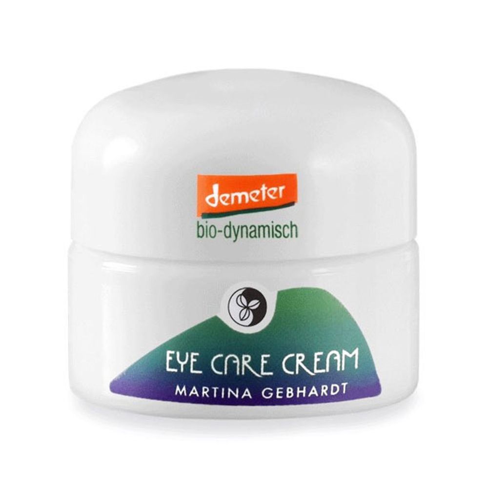 Weißes Cremetiegel mit Deckel. Aufschrift: Eye Care Cream, Martina Gebhardt. Demeter-Logo. Grün-blauer Streifen.