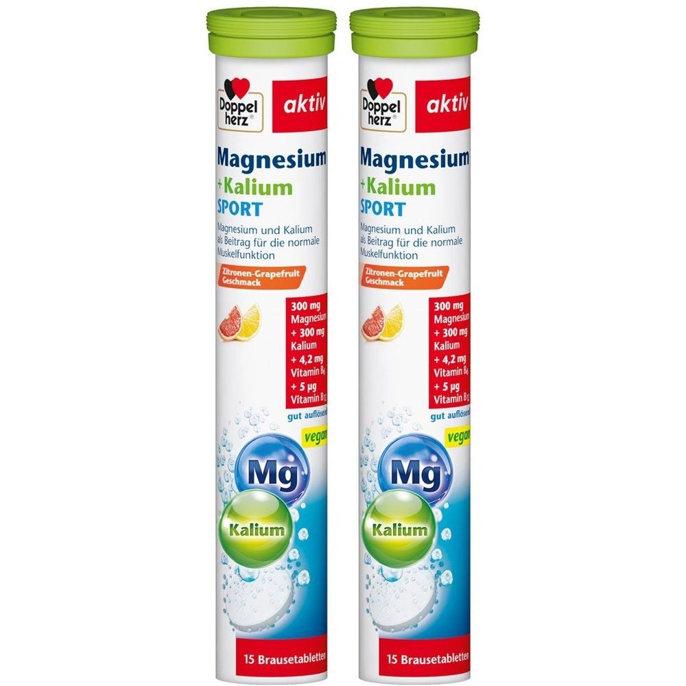 Zwei zylindrische Behälter mit Doppelherz aktiv Magnesium + Kalium Sport Brausetabletten. Grün-weißes Etikett, Text und Logos.