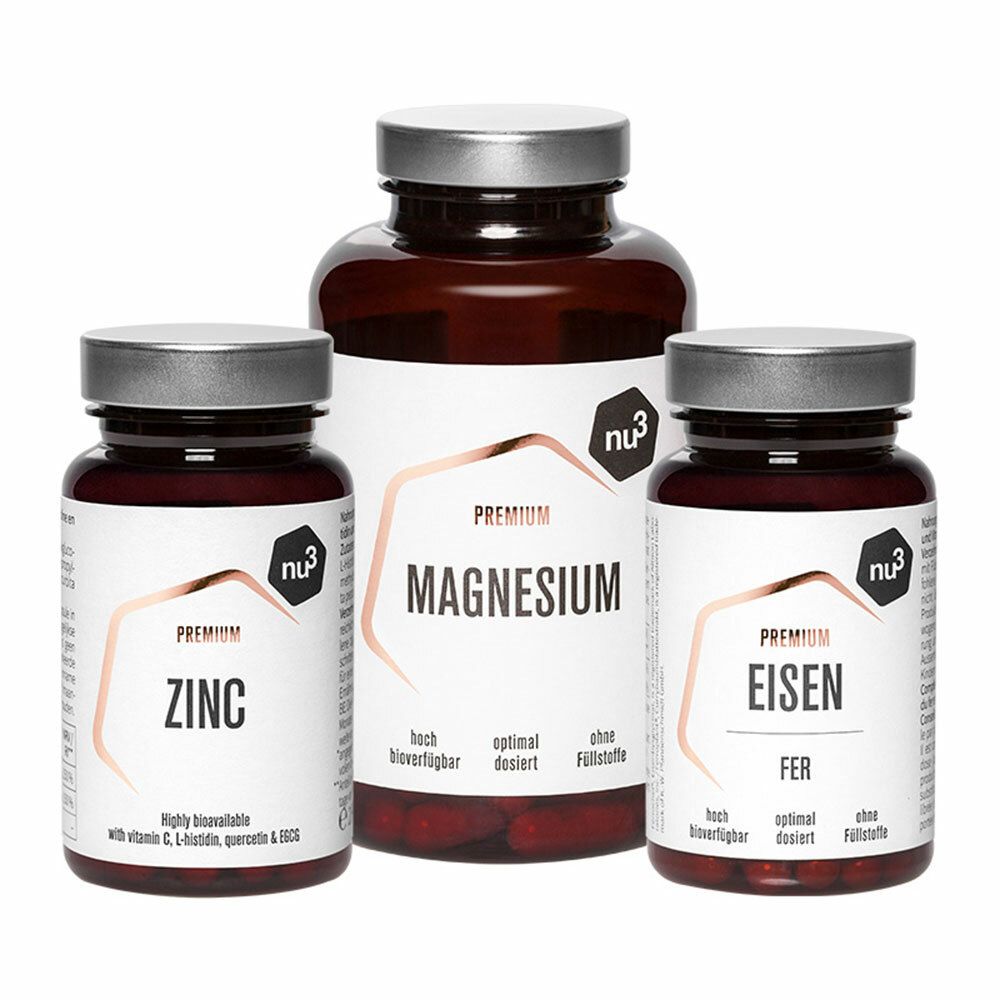 Drei braune Pillendosen mit weißen Etiketten. Auf den Etiketten stehen die Aufschriften: Zink, Magnesium und Eisen. Die Marke ist nu3.