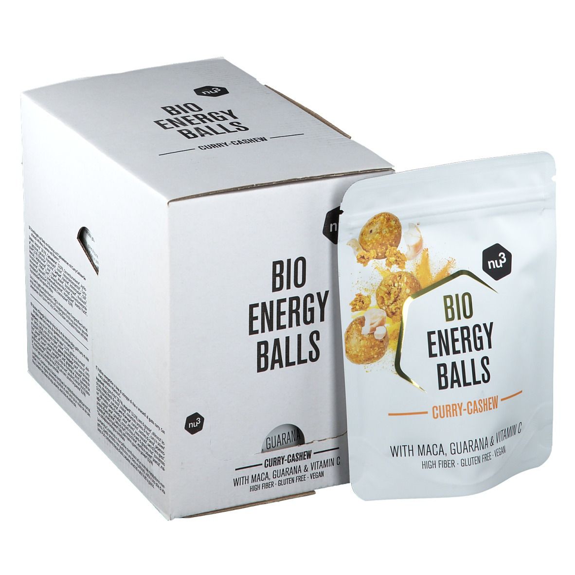Weiße Kartonverpackung und Beutel mit Aufschrift "BIO ENERGY BALLS Curry-Cashew". Beutel zeigt Produktabbildung und Zutaten.