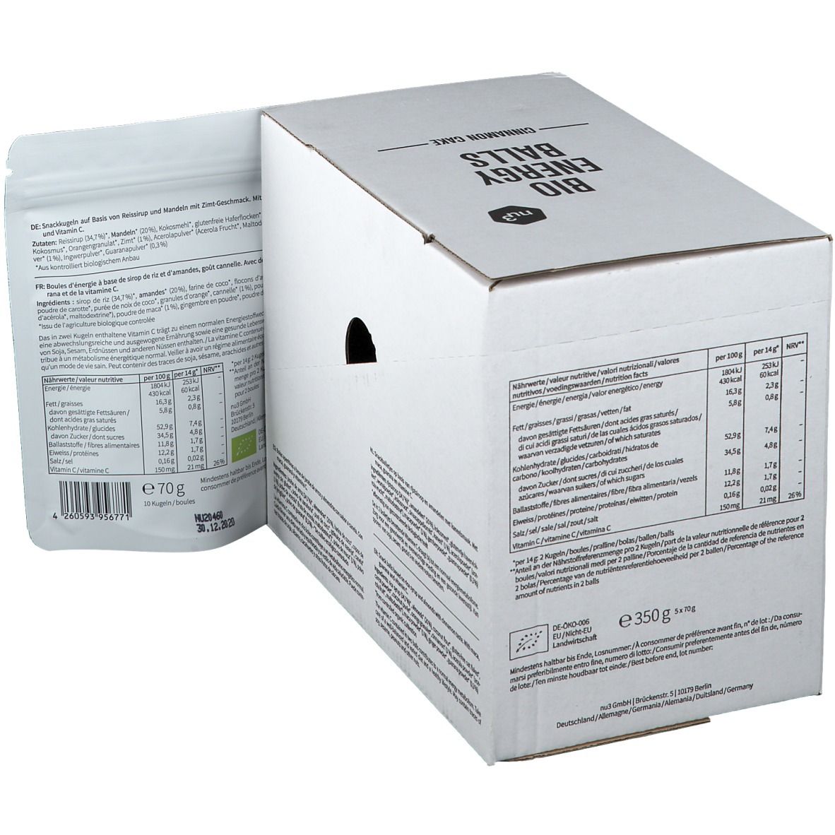 Kartonverpackung mit Produktinformationen und Nährwerttabelle. Ein Beutel mit Produktinformationen liegt daneben. Aufdrucke in mehreren Sprachen.
