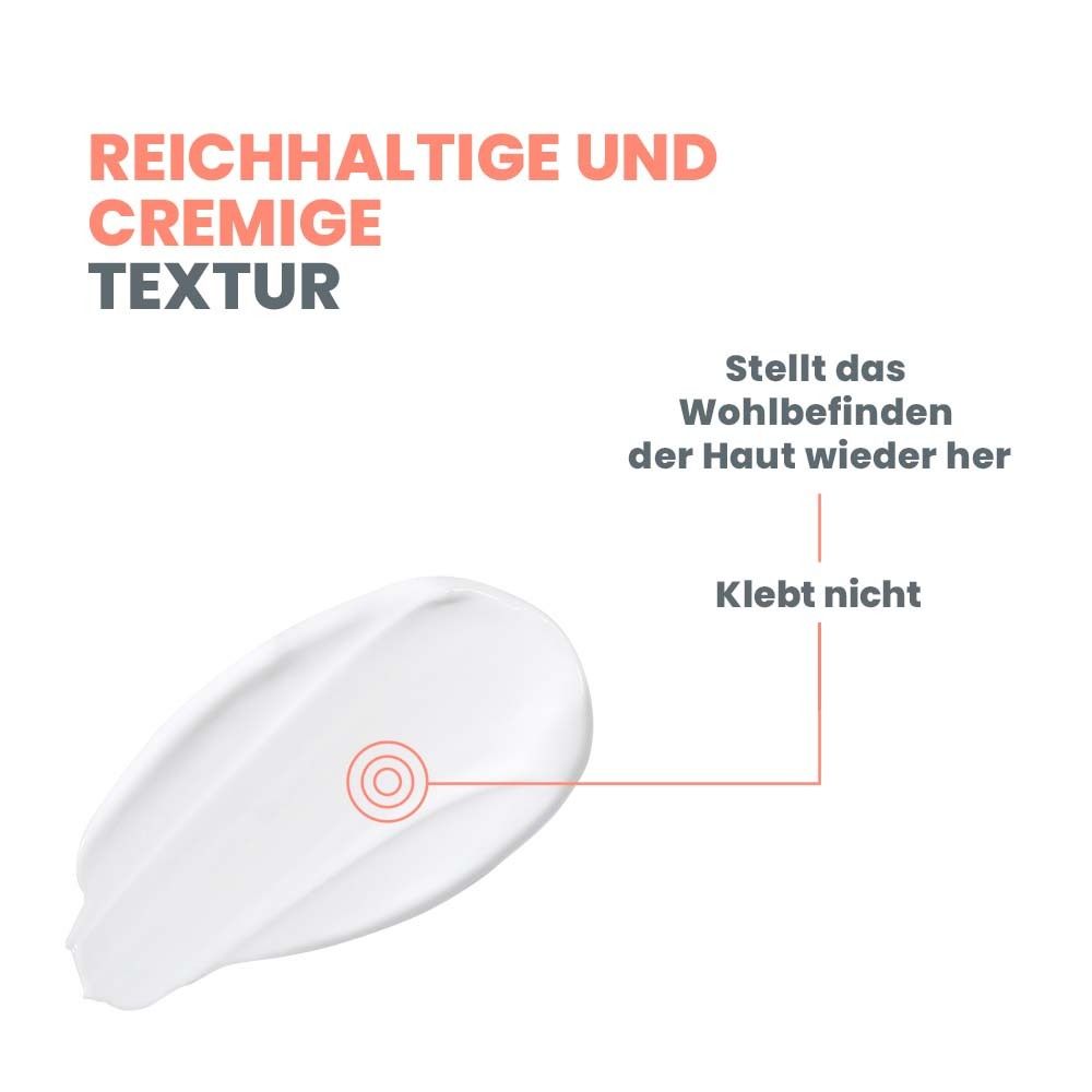Creme-Textur. Stellt das Wohlbefinden der Haut wieder her. Klebt nicht. Weißer Creme-Klecks.
