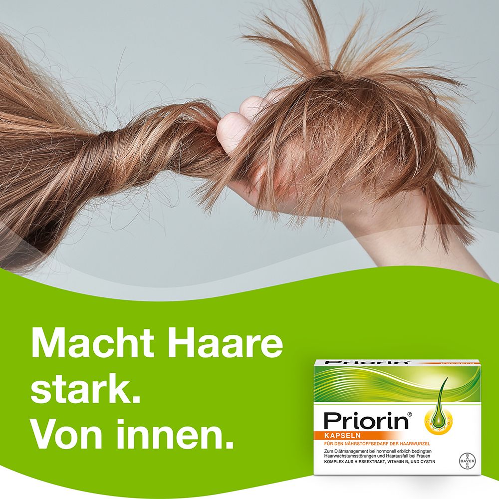 Hand hält Haare. Priorin Kapseln-Packung. Text: Macht Haare stark. Von innen.