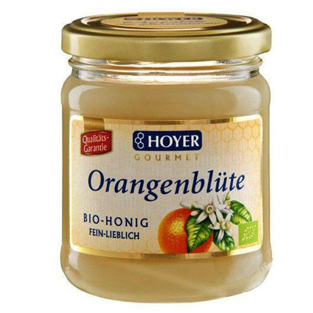 Glas Honig mit goldfarbenem Deckel. Etikett mit "HOYER" und "Orangenblüte". Bio-Siegel.