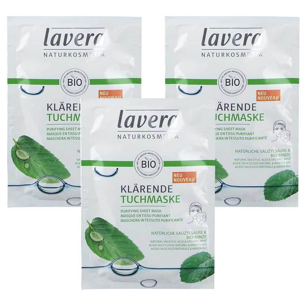Drei Packungen lavera Tuchmaske. Weiße Verpackung mit grünem Akzent. Aufdruck: BIO, Klärende Tuchmaske, Kräutermotiv.