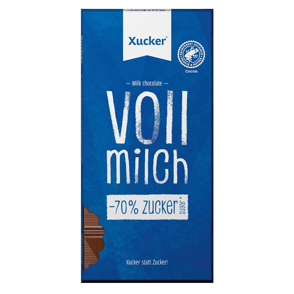 Blaue Verpackung von Xylit-Schokolade Vollmilch. Text: -70% Zucker. Siegel: Rainforest Alliance.
