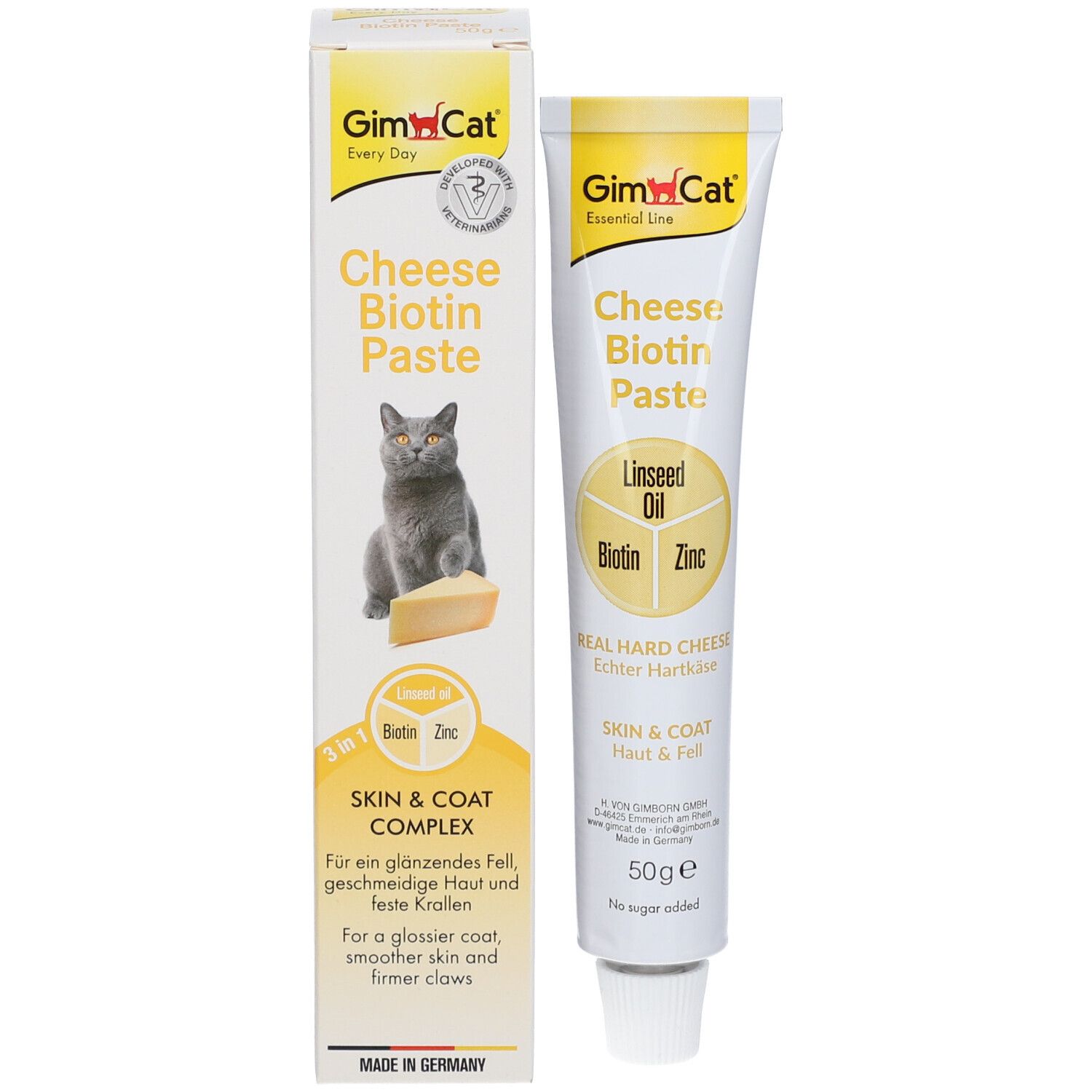 GimCat Cheese Biotin Paste mit Verpackung. Aufschrift: Cheese Biotin Paste, Linseed Oil, Biotin, Zinc, Skin & Coat. Katze mit Käse.