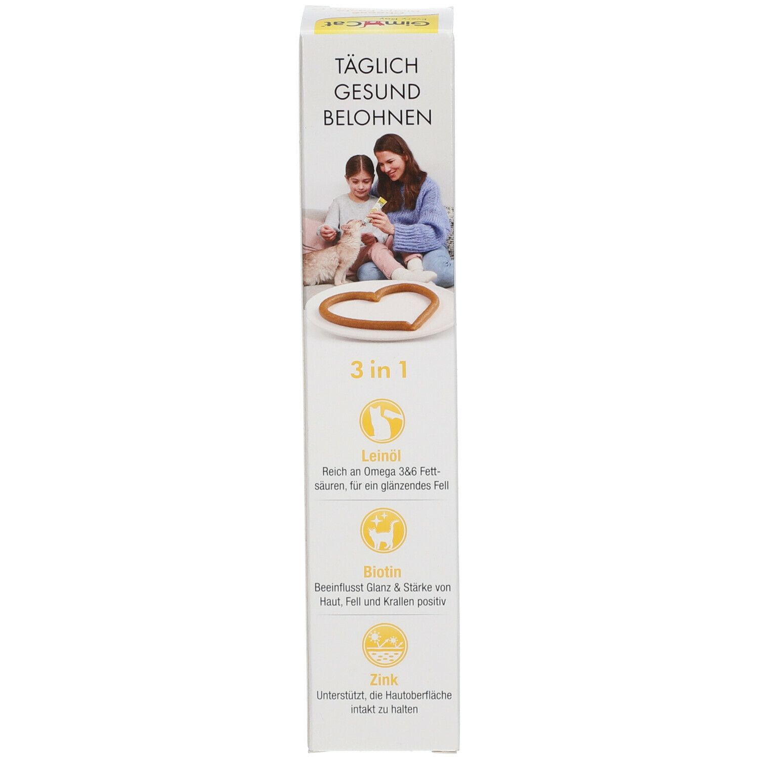 Verpackung GimCat Cheese Biotin Paste. Seite mit Bild von Kindern und Katze. Aufschrift: 3 in 1, Leinsamenöl, Biotin, Zink.