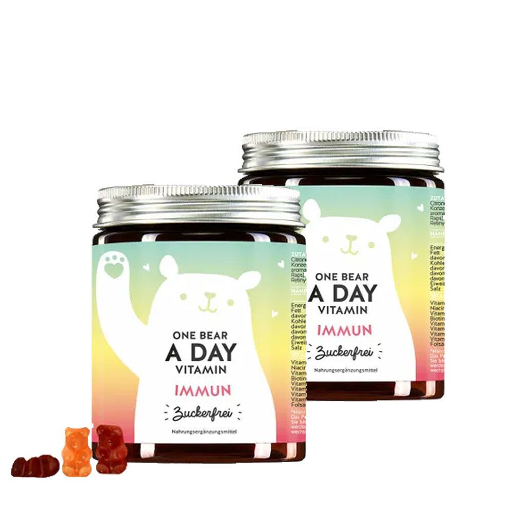Zwei Gläser mit Vitamin-Gummibärchen. Aufschrift: ONE BEAR A DAY VITAMIN IMMUN. Zusatz: Zuckerfrei. Gummibärchen liegen davor.