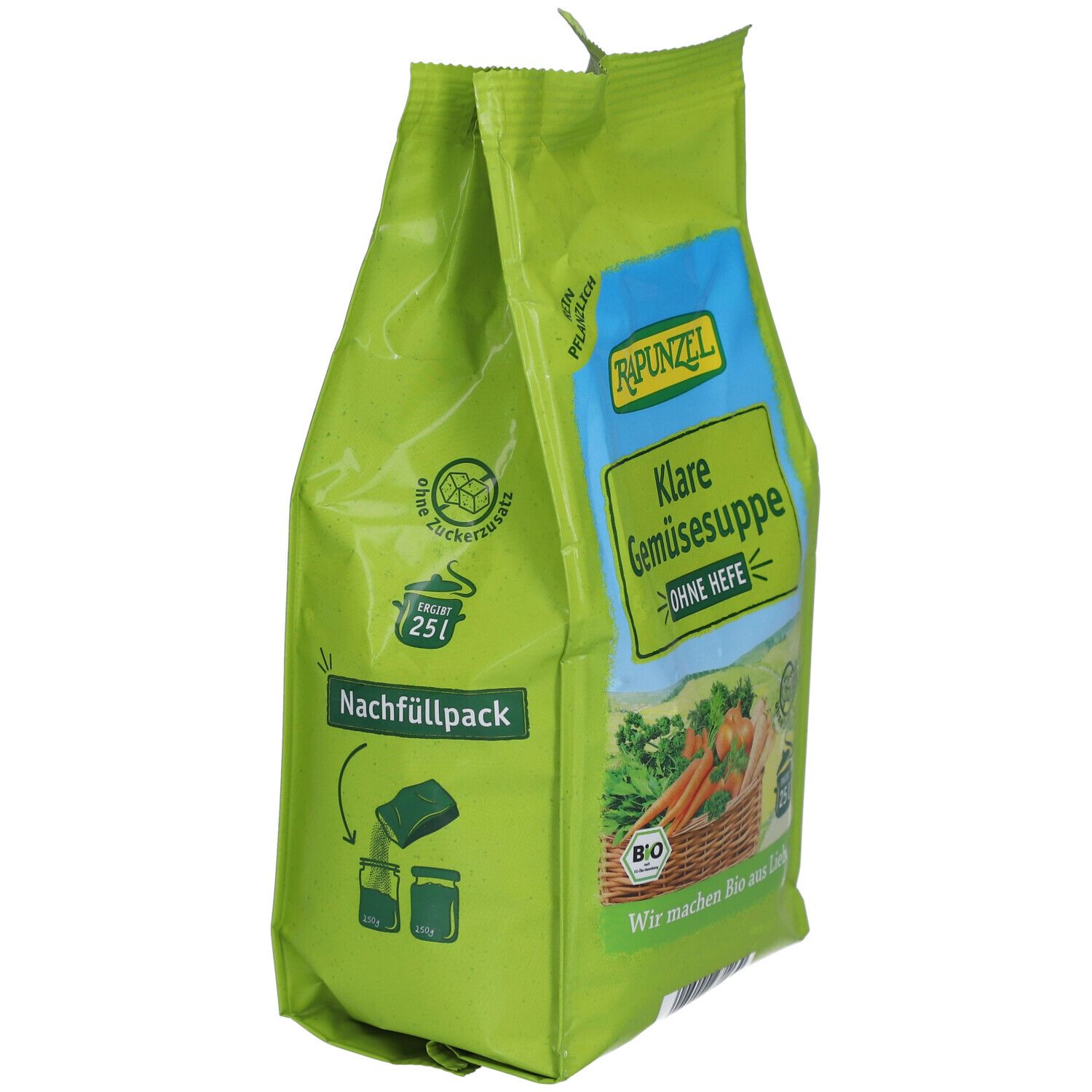 Grüne Verpackung RAPUNZEL Klare Gemüsesuppe ohne Hefe. Ansicht von der Seite. Nachfüllpack-Logo. Illustration von Gemüse.