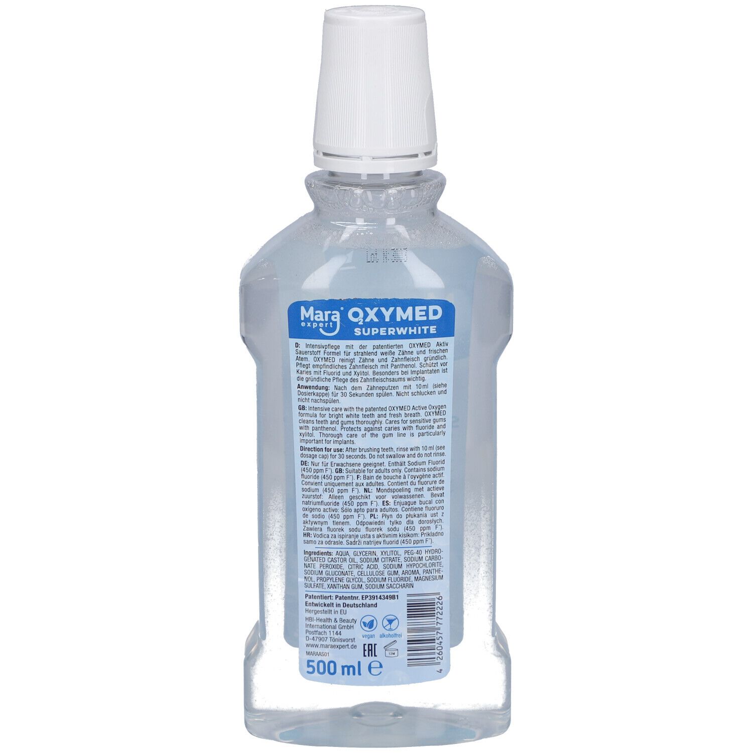 Rückseite der OXYMED Mundspülungsflasche. Transparente Flasche mit blauem Inhalt. Weißer Deckel. Etikett mit Text und Inhaltsstoffen. 500 ml.