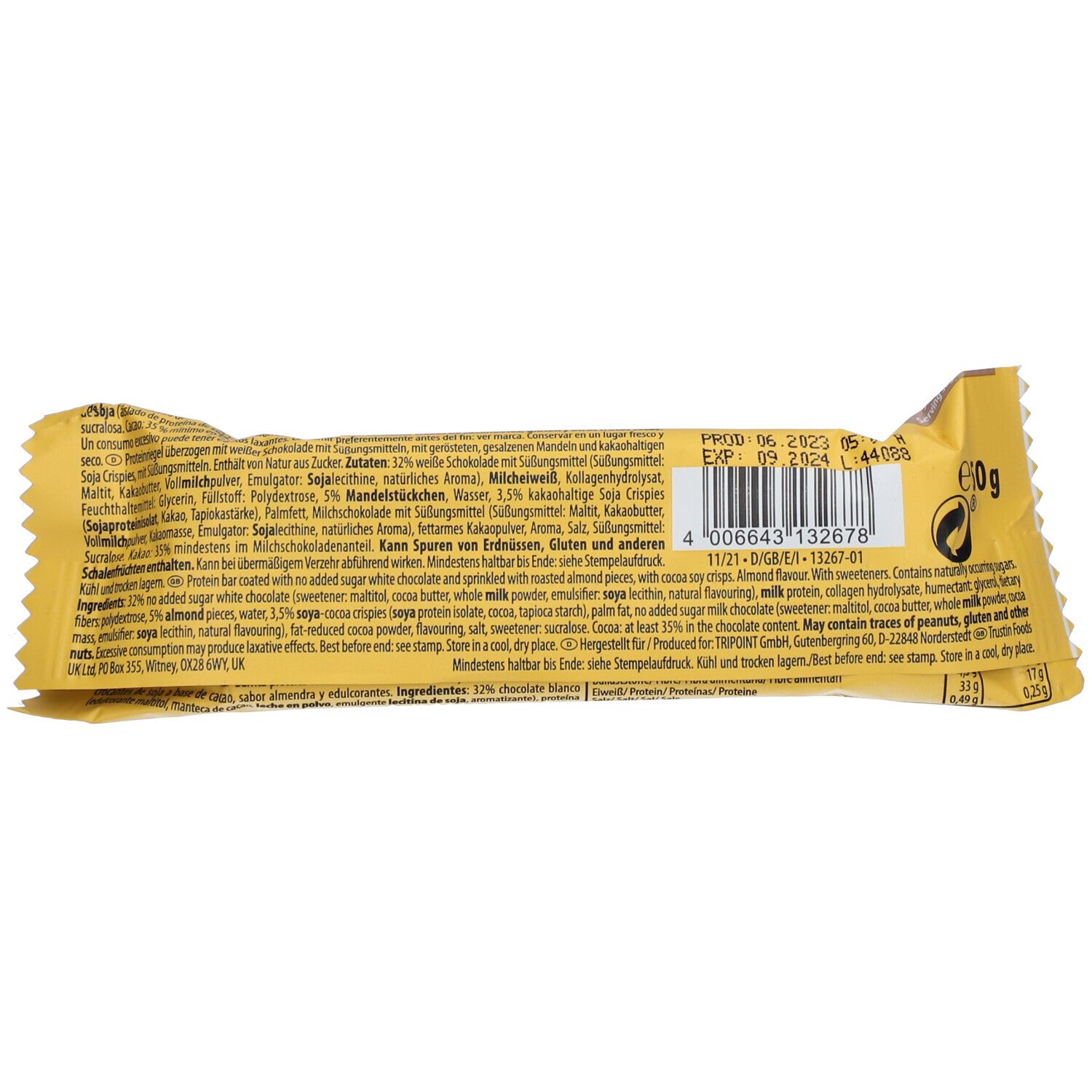 Rückseite der Proteinriegel-Verpackung. Text mit Zutaten und Nährwertangaben. Haltbarkeitsdatum und Barcode.