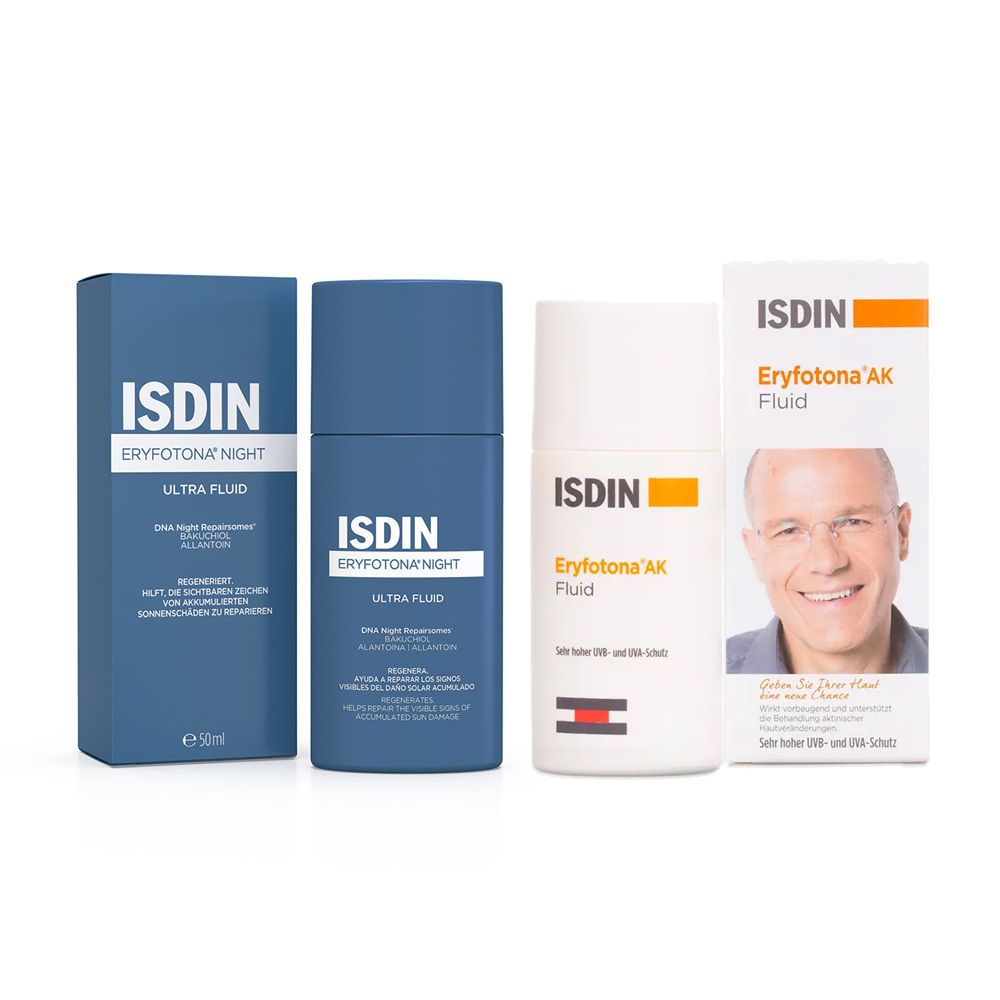 Zwei blaue Flaschen und zwei Kartons von ISDIN Eryfotona® Night und AK-NMSC. Aufschrift: Ultra Fluid, DNA Night, Bakuchiol, Allantoin.