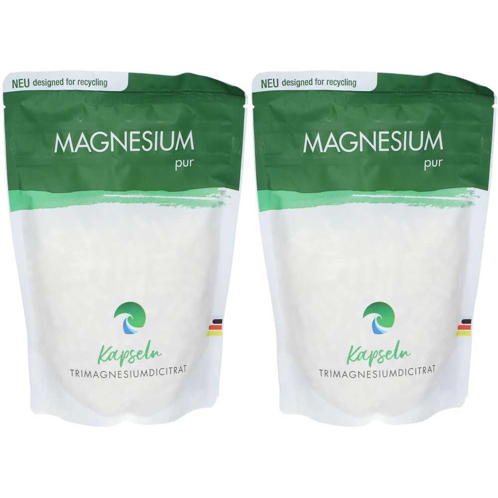 Zwei Beutel mit Kapseln. Aufschrift MAGNESIUM pur, Kapseln, TRIMAGNESIUMDICITRAT. Grün-weiße Verpackung mit Recycling-Hinweis.