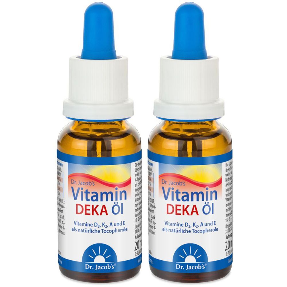 Zwei Flaschen Dr. Jacob's Vitamin Deka Öl mit blauen Pipetten. Etikett mit Produktinformationen.