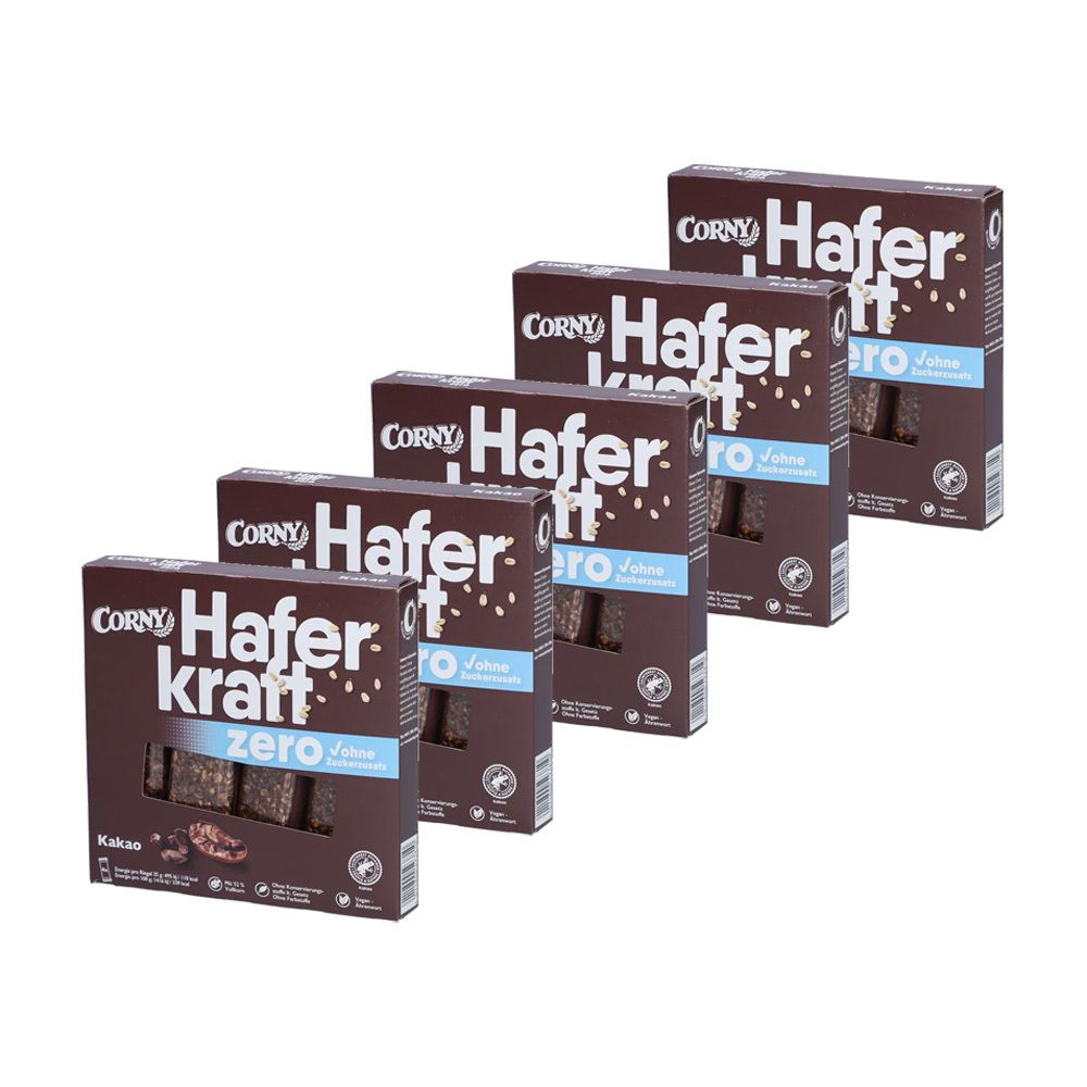 Mehrere Schachteln CORNY Haferkraft zero Kakao. Braune Verpackung mit weißer Schrift. Sichtbare Produktstücke.