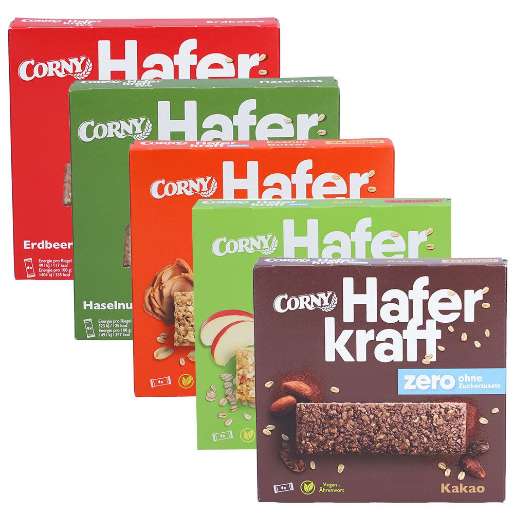 Fünf Schachteln Corny Haferkraft Zero Probier-Set. Verschiedene Geschmacksrichtungen: Erdbeer, Haselnuss, Apfel, Kakao. Aufdrucke: Corny, Hafer, zero, ohne Zuckerzusatz.