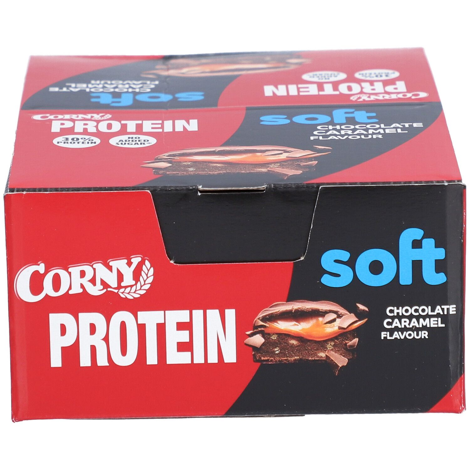 Rote und schwarze Schachtel mit Corny Protein Soft. Aufdruck: Schokolade-Karamell-Geschmack, 30% Protein, ohne Zuckerzusatz.
