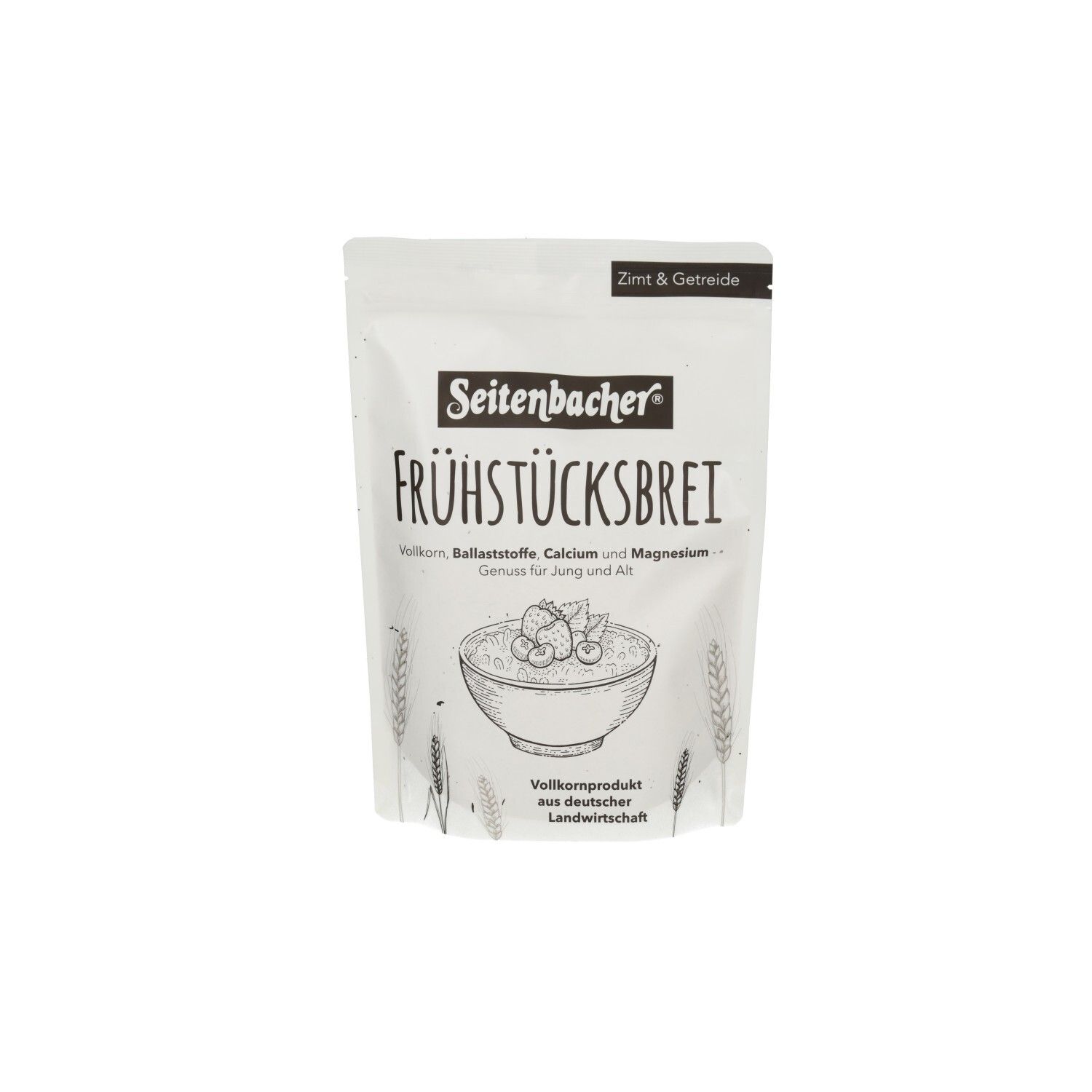 Beutel Seitenbacher Vollkorn-Brei mit Zimt. Oben Text: Quelle für Ballaststoffe, Eisen & Magnesium. Abbildung mit Beeren und Mandeln.