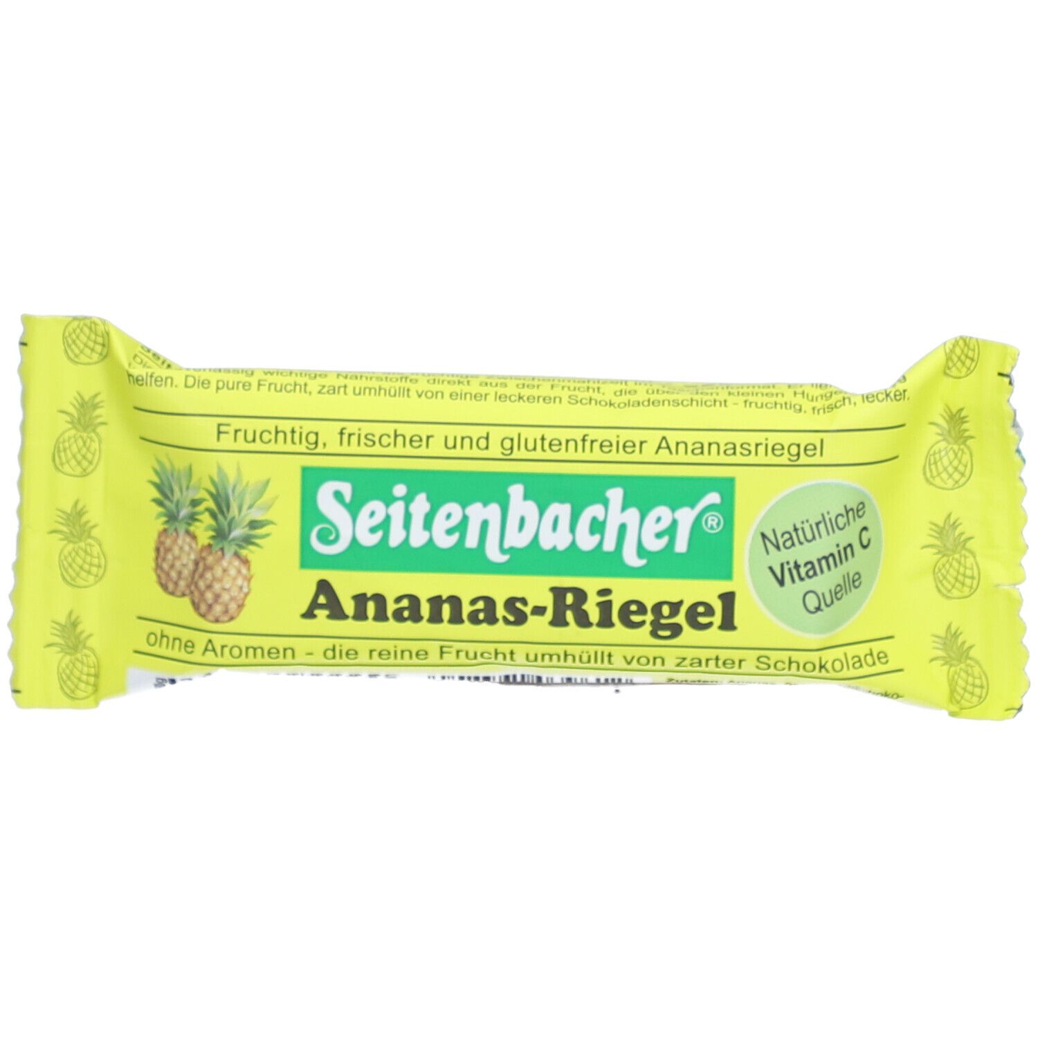 Gelbe Verpackung mit "Seitenbacher Ananas-Riegel". Ananas-Illustrationen. Text: "Vitamin C Quelle".