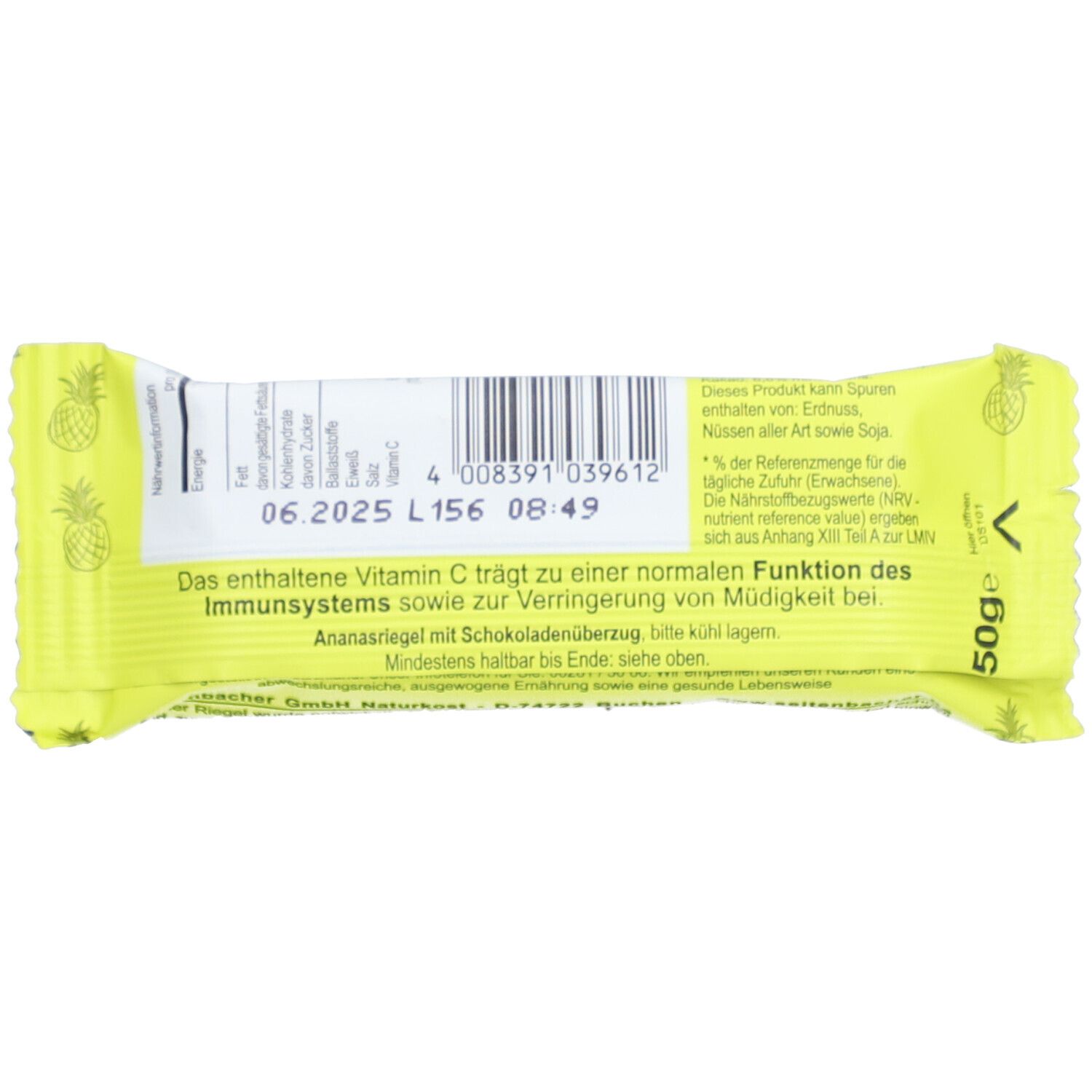 Rückseite der gelben Verpackung. Text: "Ananasriegel mit Schokoladenüberzug". Enthält Informationen und Barcode.