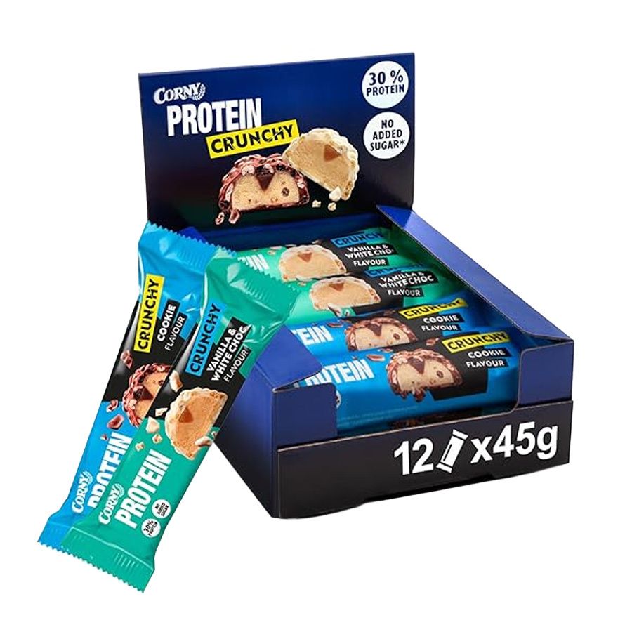 Corny Protein Crunchy 12er Mix Pack. Riegel in geöffneter Box. Blaue und weiße Verpackung. 30% Protein, ohne Zuckerzusatz.