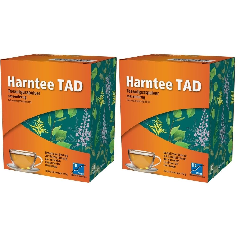 Zwei quadratische Kartons mit "Harnttee TAD Teeaufgusspulver"-Aufdruck. Orange-grünes Design mit Teetasse-Illustration.