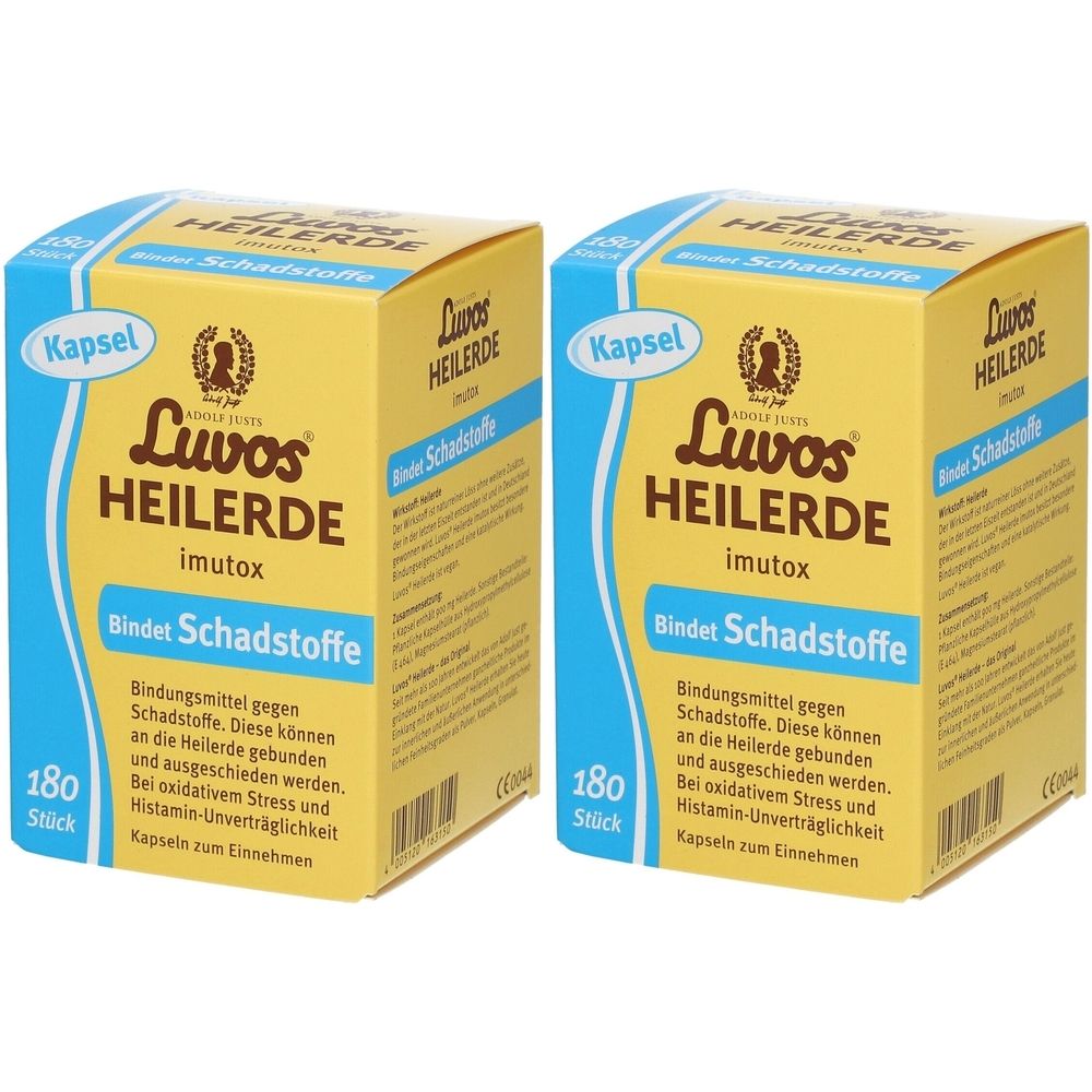 Zwei gelbe Kartons mit der Aufschrift "Luvos Heilerde imutox". Text: "Bindet Schadstoffe". 180 Stück.