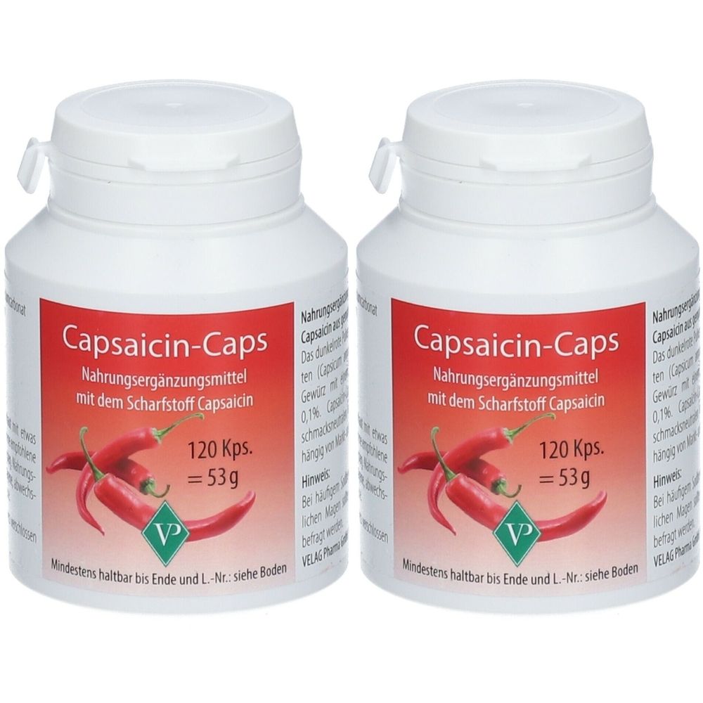 Zwei weiße Flaschen mit "Capsaicin-Caps"-Etiketten. Aufschrift: Nahrungsergänzungsmittel mit Capsaicin. 120 Kps. = 53g. Logo: VP.