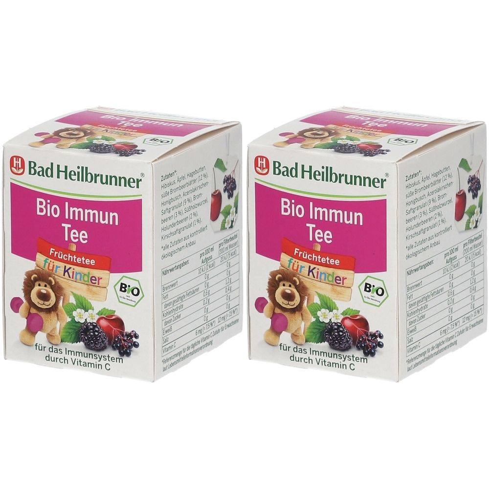 Zwei Kartons Bad Heilbrunner Bio Immun Tee für Kinder. Aufschrift: Früchtetee, für das Immunsystem durch Vitamin C. Mit Bio-Siegel und Löwen-Illustration.