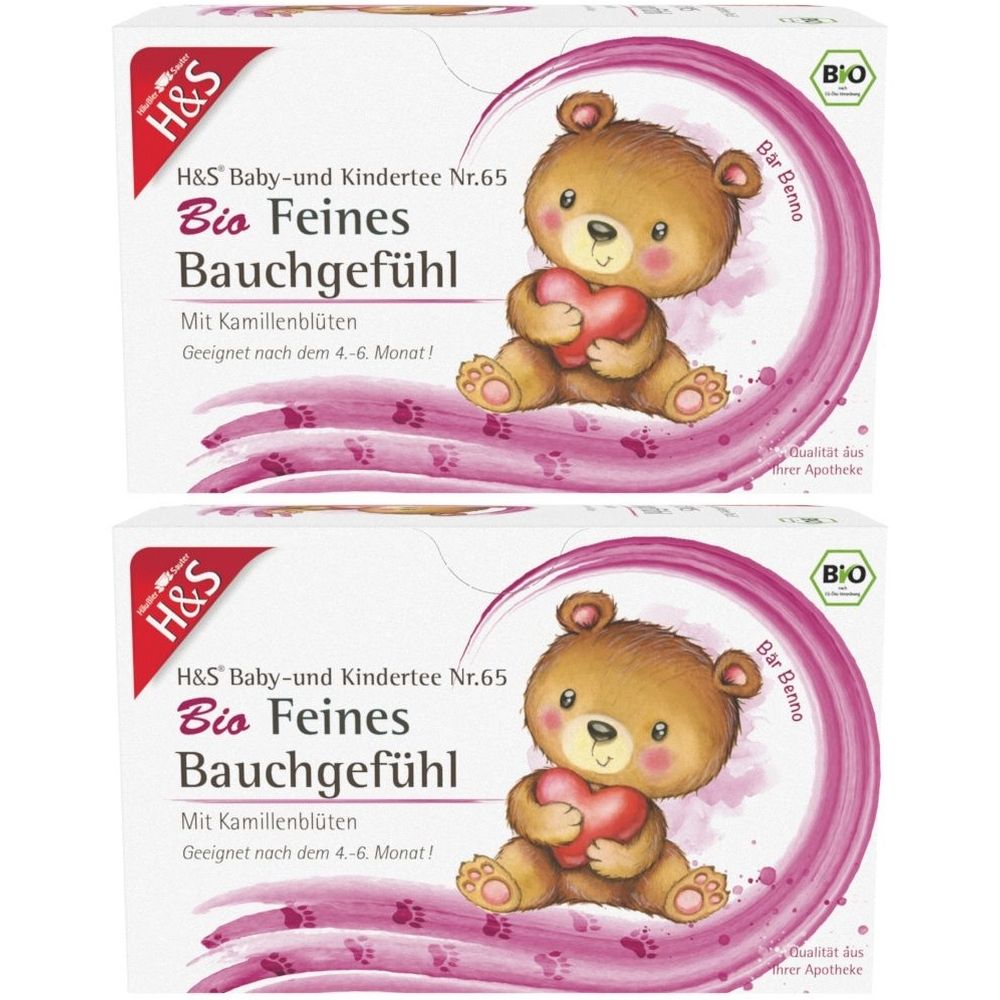 Zwei Packungen H&S Baby- und Kindertee. Aufdruck: Bio Feines Bauchgefühl, Teddybär mit Herz. Mit Kamillenblüten. Geeignet ab 4-6 Monaten. BIO-Siegel.